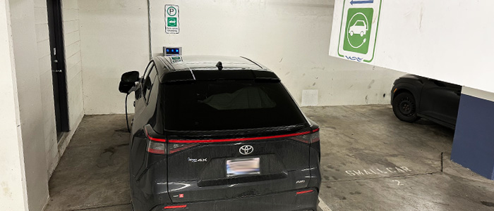 A Toyota sits charging at an EV charger in the Vancouver Island Conference Centre parkade in Nanaimo.